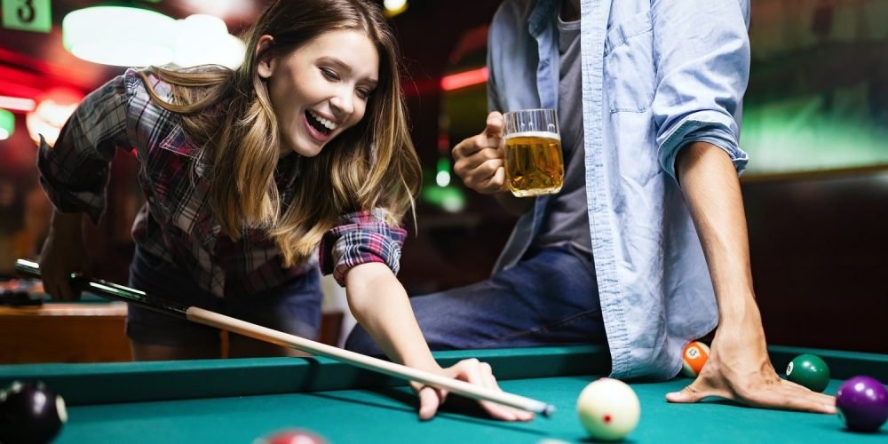 happy-young-man-playing-snooker-with-his-girlfrien-2021-08-26-17-34-09-utc-min.jpg